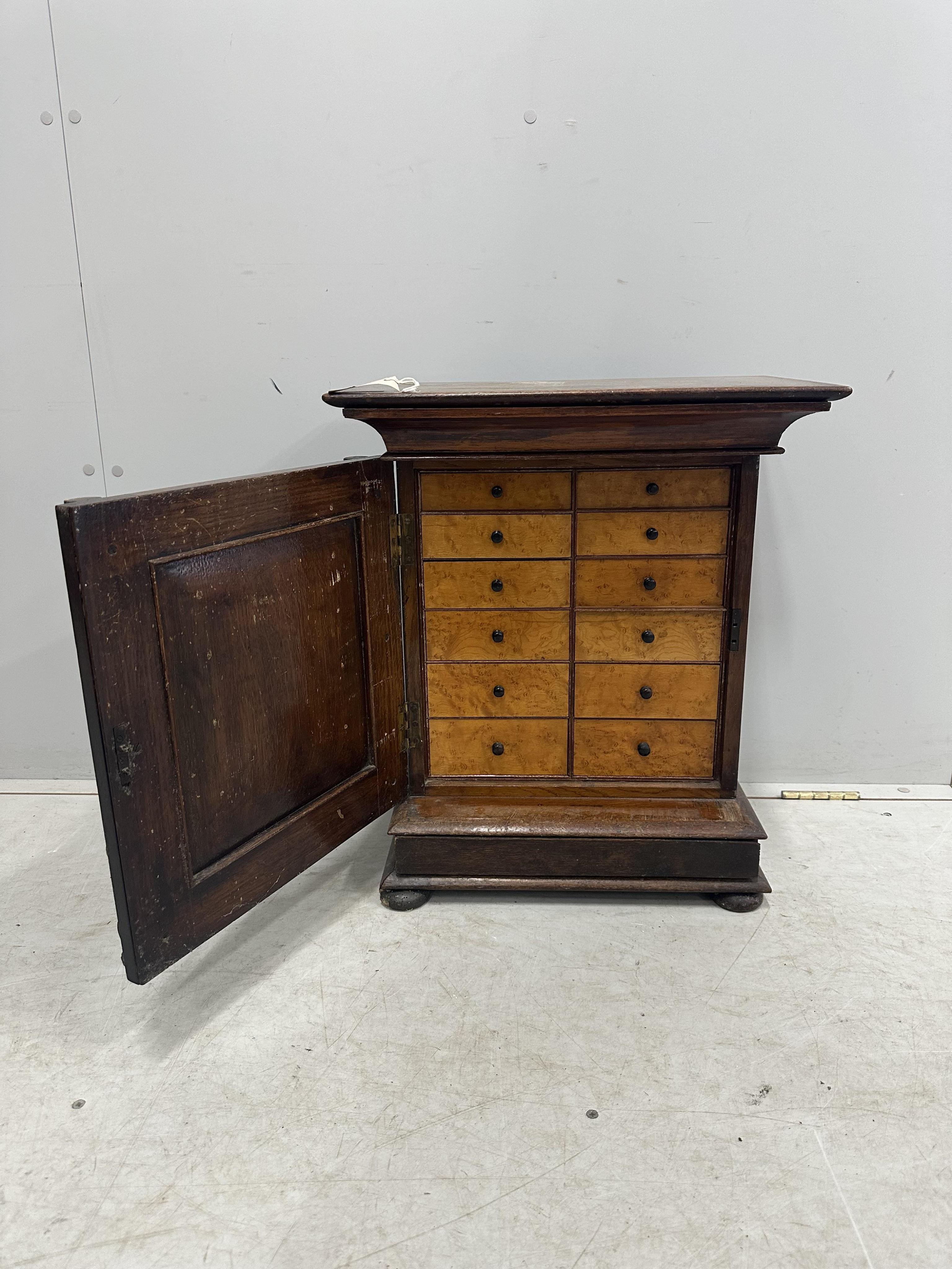 A late 19th century Flemish table cabinet, width 50cm, depth 29cm, height 58cm. Condition - fair